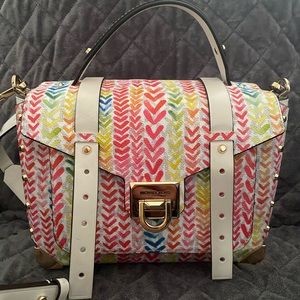 Well maintained with front multi color stitching